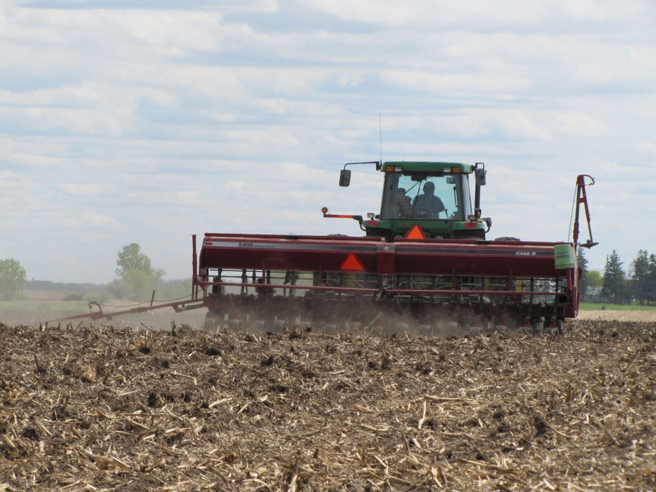 Drill planting crop.