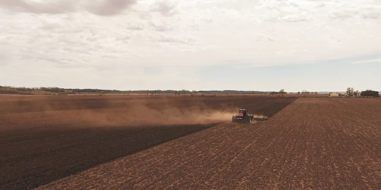 Tractor Planting in Field