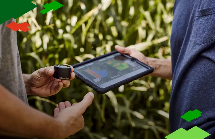 Farmer and Agronomist in Field with iPad and FieldView Drive