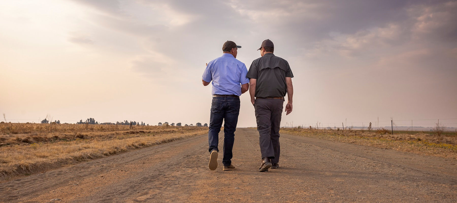 Two farmers walking