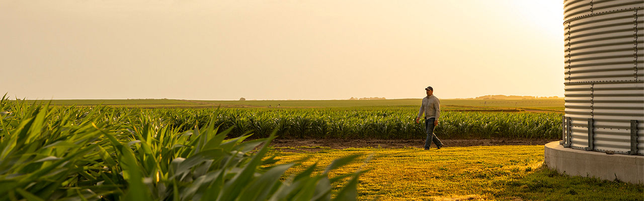 A farmer walking on a field