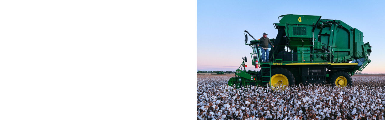 Grower standing on cotton picker