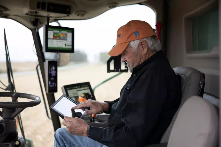 farmer_editing_digital_device_1