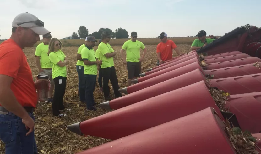 Team Looking over Combine