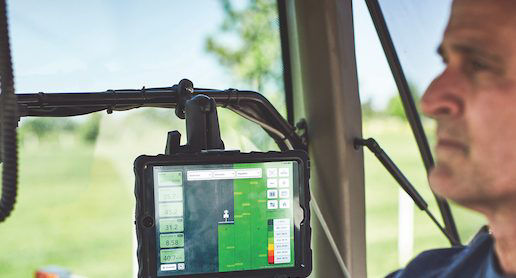 Farmer using precision planting tools 