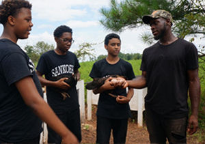 Students who participate in the Sankofa Farms Agricultural Academy