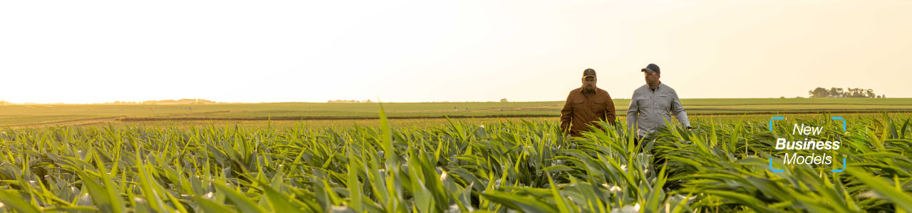Two men walking in field for Channel seed showcase